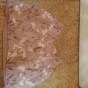 A cropped flowy tank top